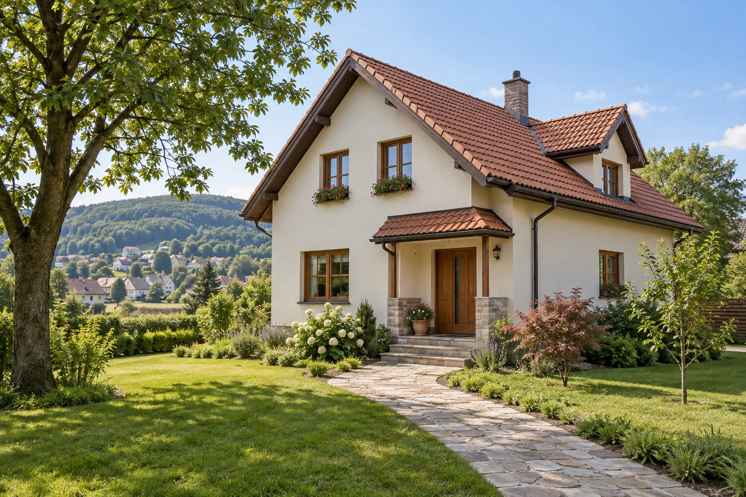 House with a pale plaster facade, tiled roof and garden in a hilly setting